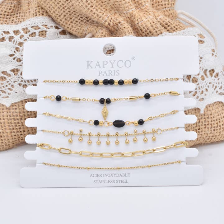 Set van 6 gouden stalen armbanden met zwarte agaatstenen voor wholesale door Kapyco