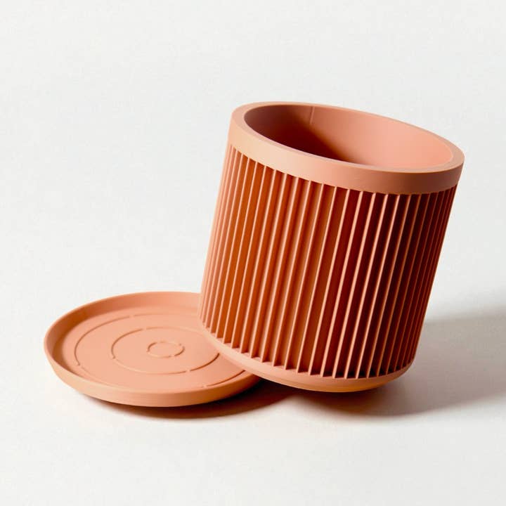 Cycle Planter – Moderner umweltfreundlicher Pflanztopf Rotes Wachs für den Großhandel von Lellume