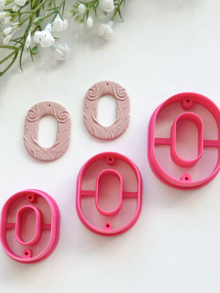 Ovaler, regulärer Donut mit Bohrführungen, aus Polymerton für den Großhandel von Tera Clay