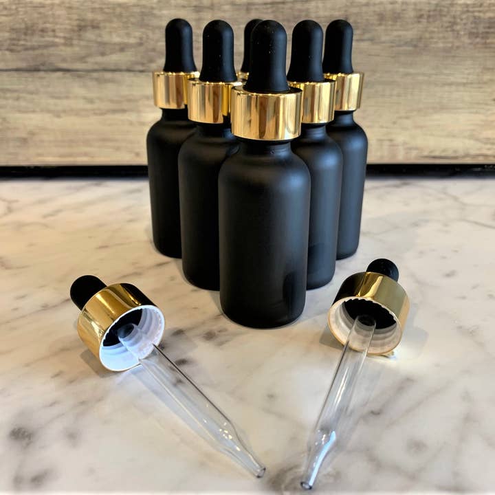 Flacon noir mat de 2 oz avec compte-gouttes en verre noir et or pour la vente par The Bottle Shoppe