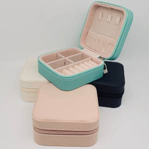 Purchase Wholesale travel jewelry box. Free Returns & Net 60 Terms on Faire