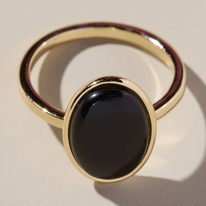 Anillo de piedra ovalada negra en oro para venta al por mayor de Nickel and Suede