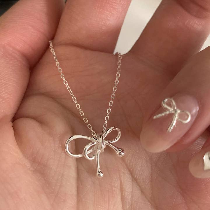 Necklace Bowtie Dainty Minimalistic Cute Silver Charm Women for wholesale by Gemscape UK