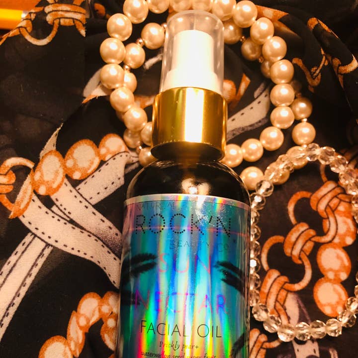 SUN 24 k CLARIFYING FACIAL OIL SERUM 2 Oz. for wholesale by Natural Rock'N Cosmetics