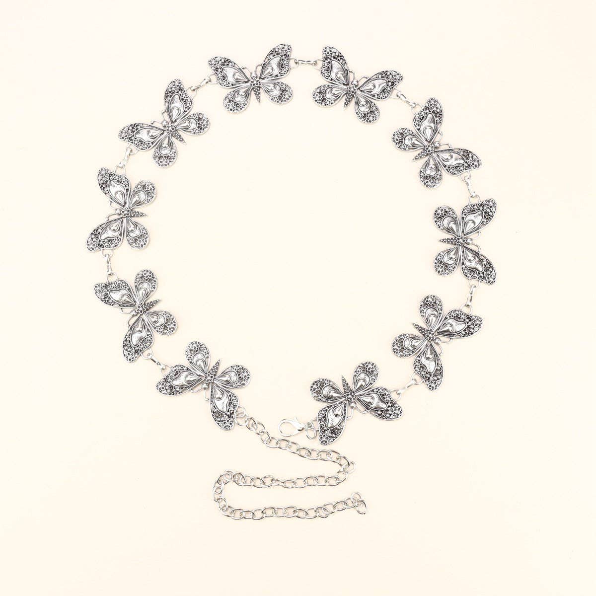 SALINA TRADING INC – Großhandel Gürtel – Damen – Metallkettengürtel mit Schmetterlings- und Herzdesign44