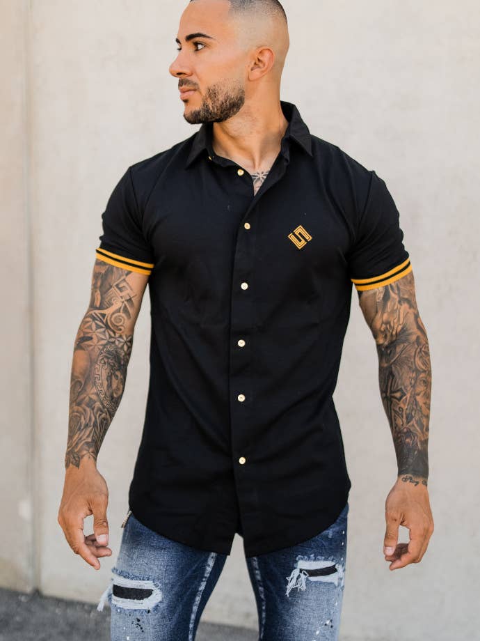Slick Svart Ringer S/S Skjorta W/Guld Rib för wholesale av Slick Store