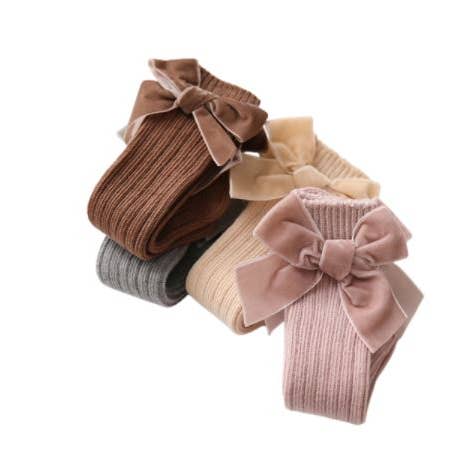 Velvet Bow Knee Socks and other Purchase Wholesale rattle socks. Free Returns & Net 60 Terms on Faire trending on Faire.