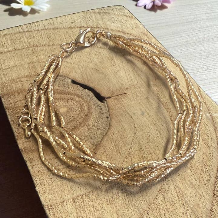 Gouden multi-strand gedraaide armband BR240G voor wholesale door Jess & Lou
