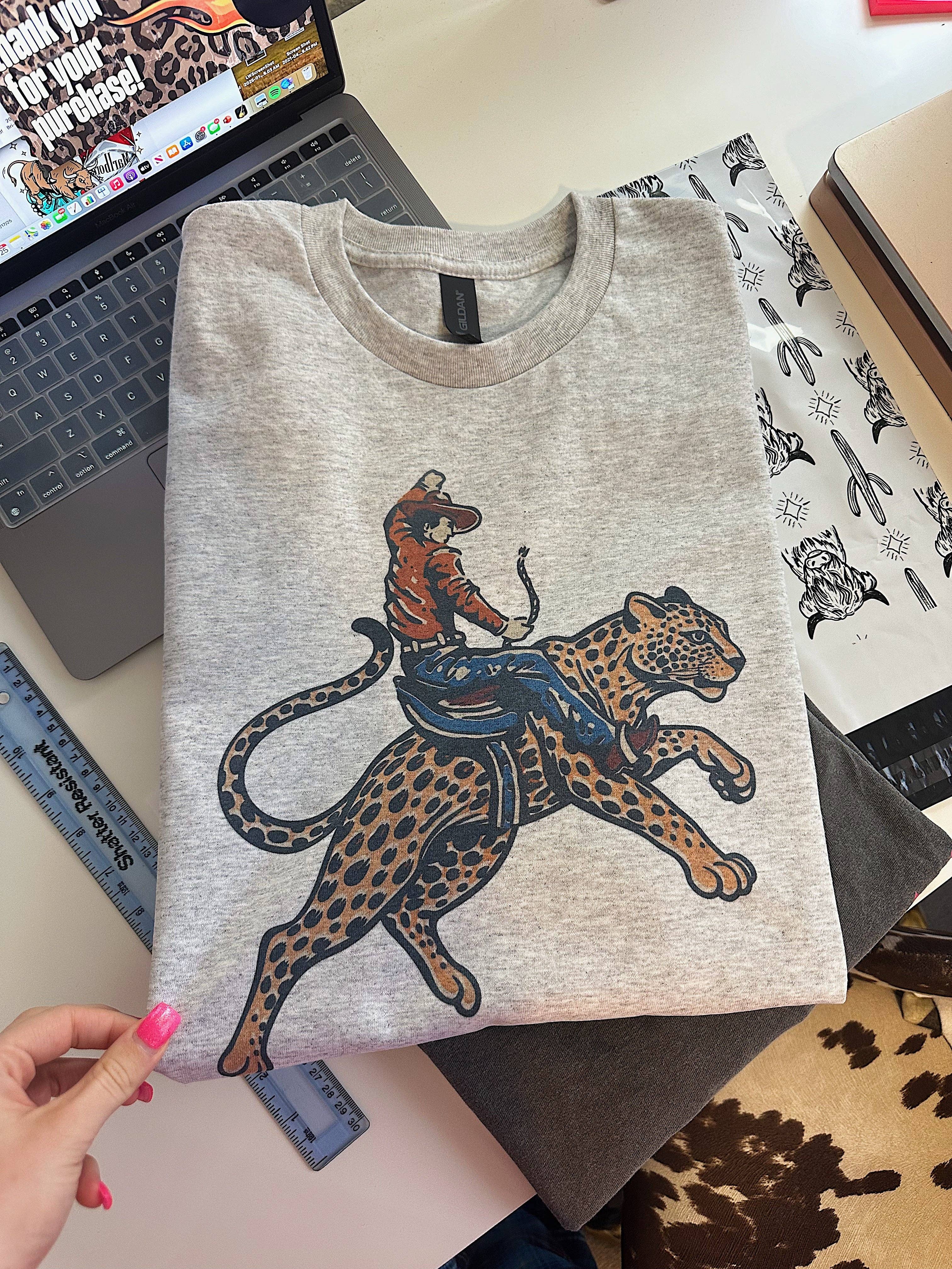 Gunpowder and Glam Boutique - Wholesale Graphic Sweatshirt - Women's - Cowboy Jaguar Tee or Crewneck1