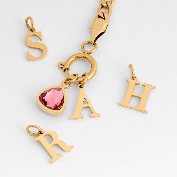 Letter charm for wholesale by DUCETT