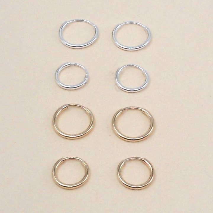 Petite Hoops (Silverfärgad 10mm) för wholesale av May Martin