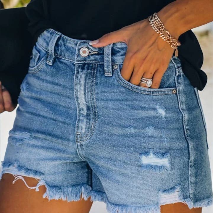Distressed Denim Shorts with Frayed Hem and other Purchase Wholesale denim shorts with patches. Free Returns & Net 60 Terms on Faire trending on Faire.
