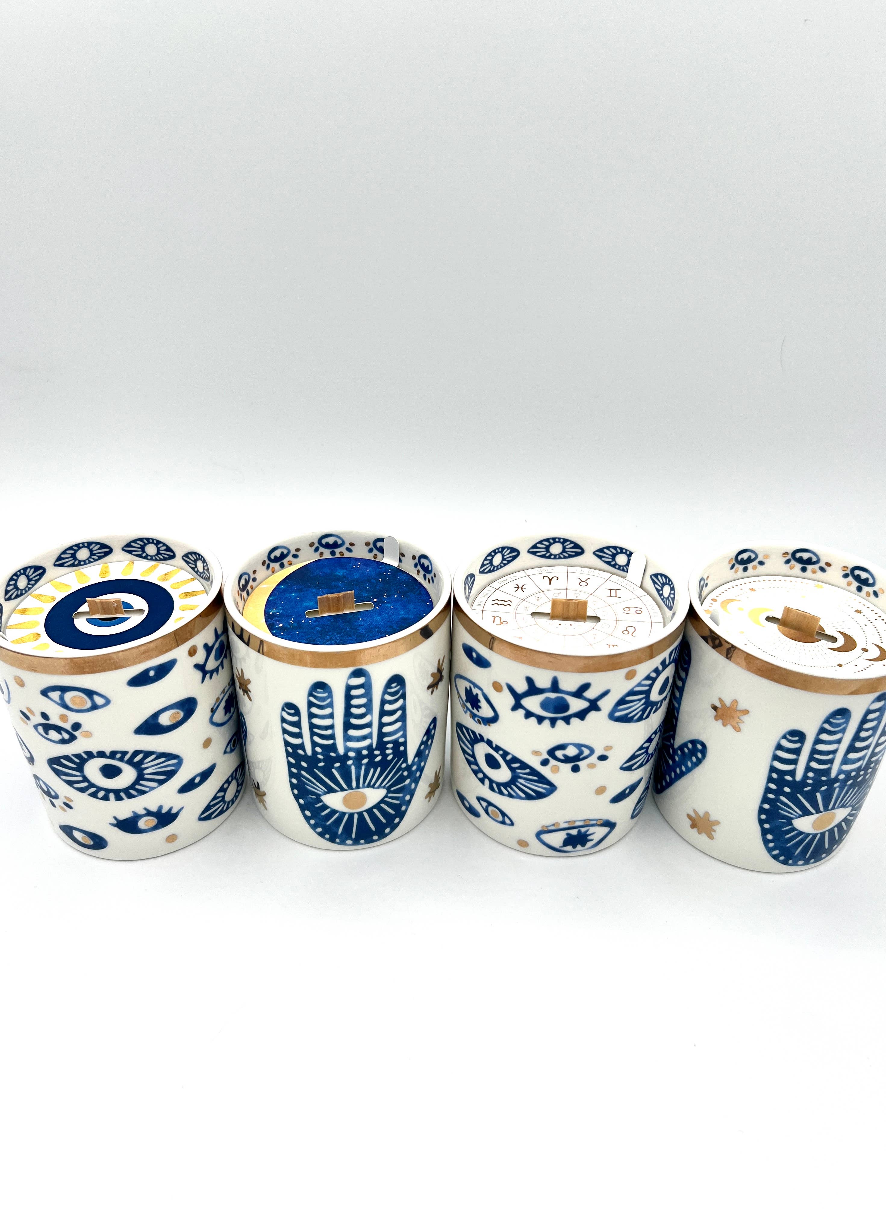 The Sacred Wild Candle Co – Velas de decoração por atacado – Nova vela Hamsa em cerâmica branca com detalhes em ouro e azul3