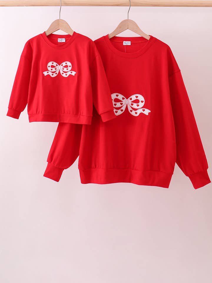 Red bow applique mom&me top and other Purchase Wholesale mom and me. Free Returns & Net 60 Terms on Faire trending on Faire.