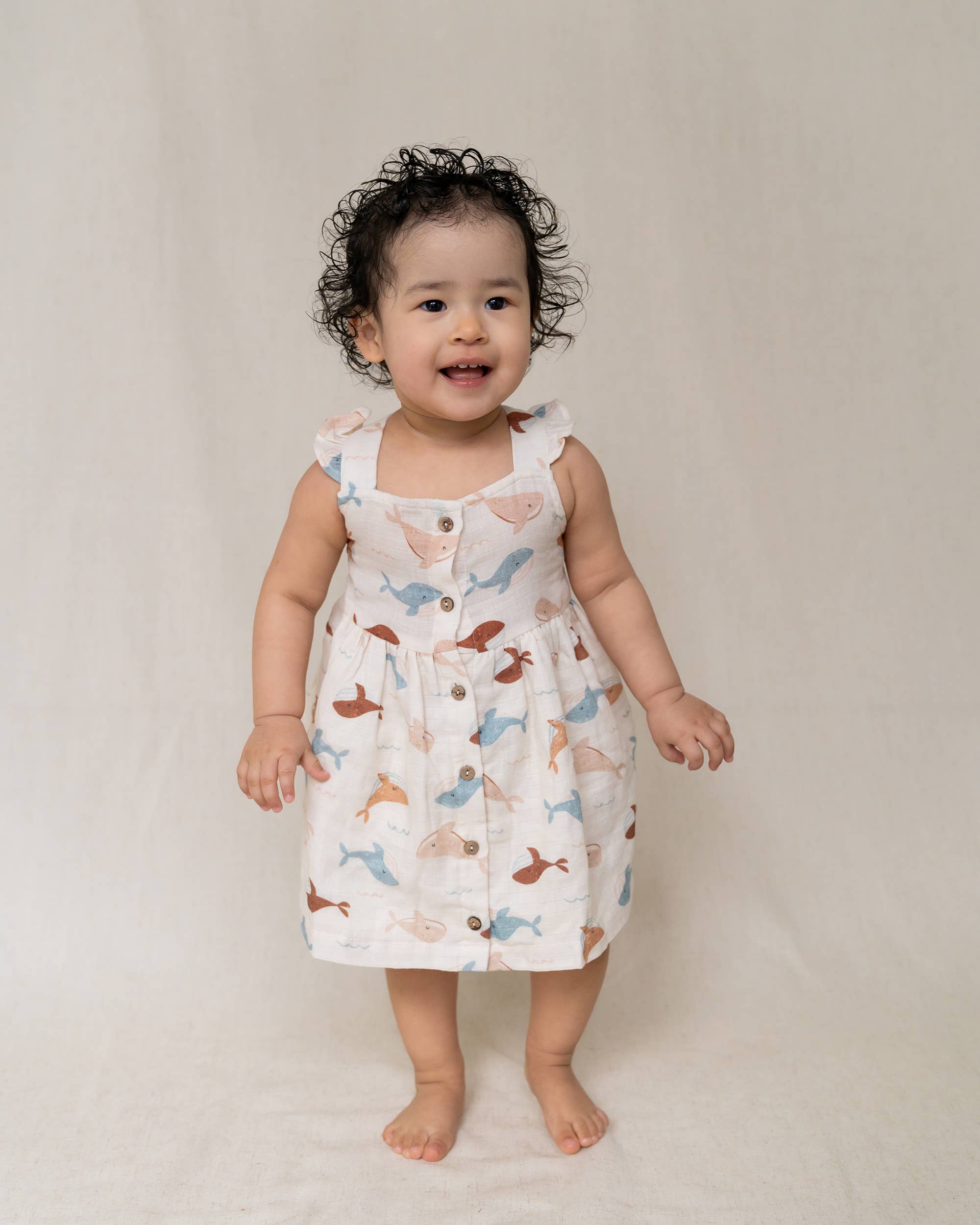 Natural Whales Ruffle & Button Baby Dress+Bloomer (Organic Muslin) for wholesale on Faire0