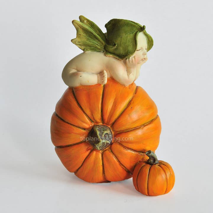 Fairy Baby On Orange Pumpkin for wholesale by Top Land Trading