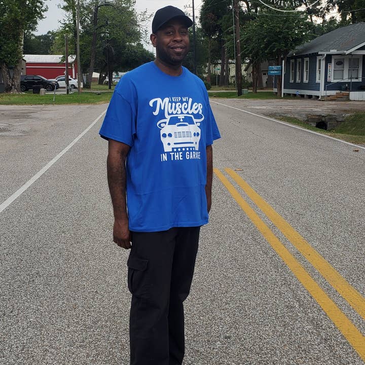 I Keep My Muscles In The Garage | Graphic Tee for wholesale by iDigBeauty1.5