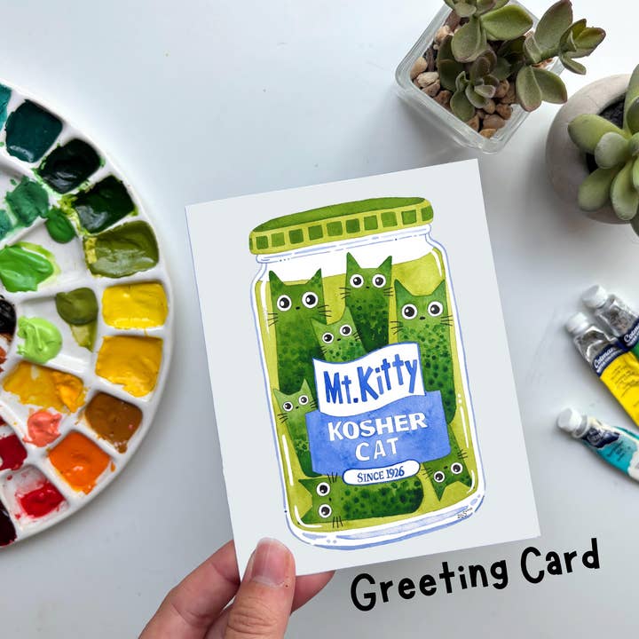 Mt. Kitty Kosher Kats Pickle Watercolor Greeting Card and other Purchase Wholesale lucky cat katzenfutter. Free Returns & Net 60 Terms on Faire trending on Faire.