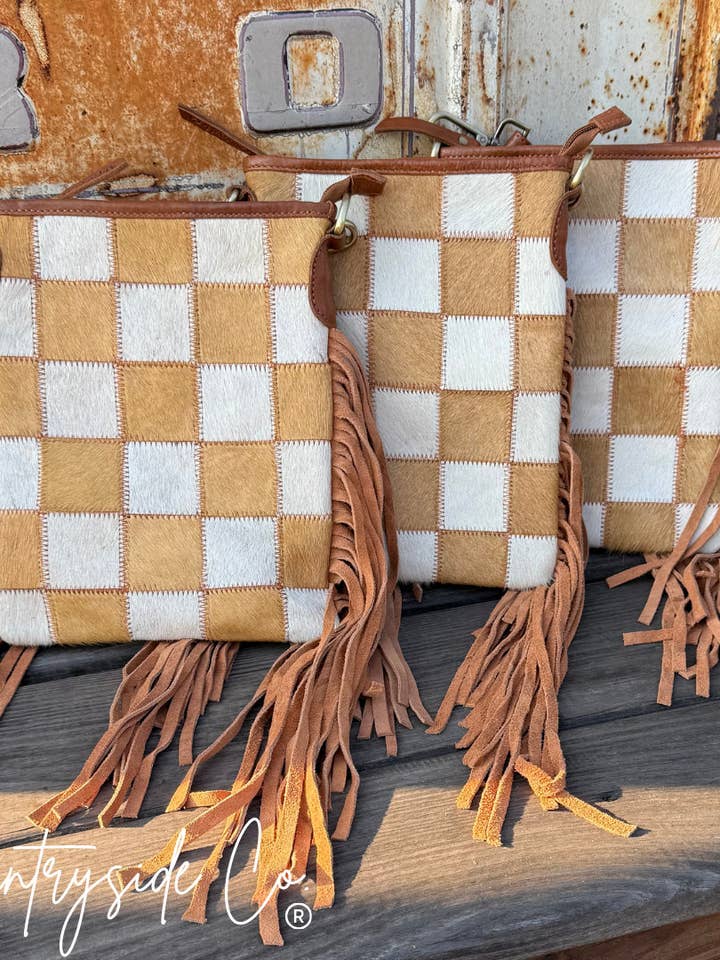 Cowhide Fringe Crossbody - Espresso for wholesale by Ganges Grain Inc