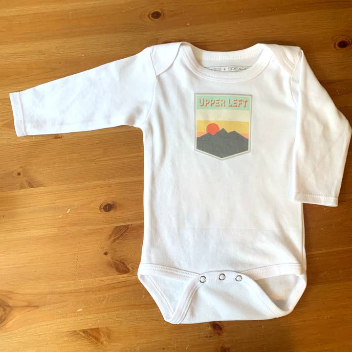 Baby LS White Bodysuit - Upper Left for wholesale by Shakes + Speares