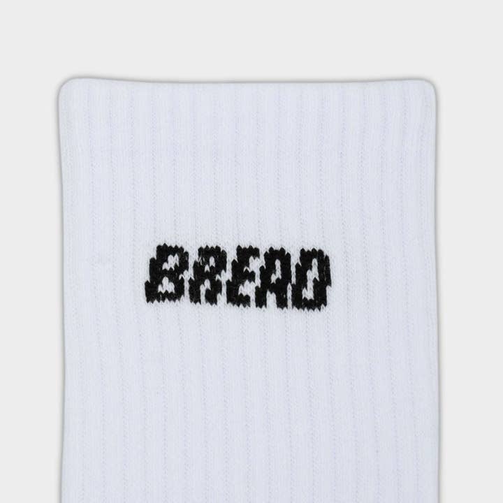 Chaussettes montantes en coton pour la vente par Bread