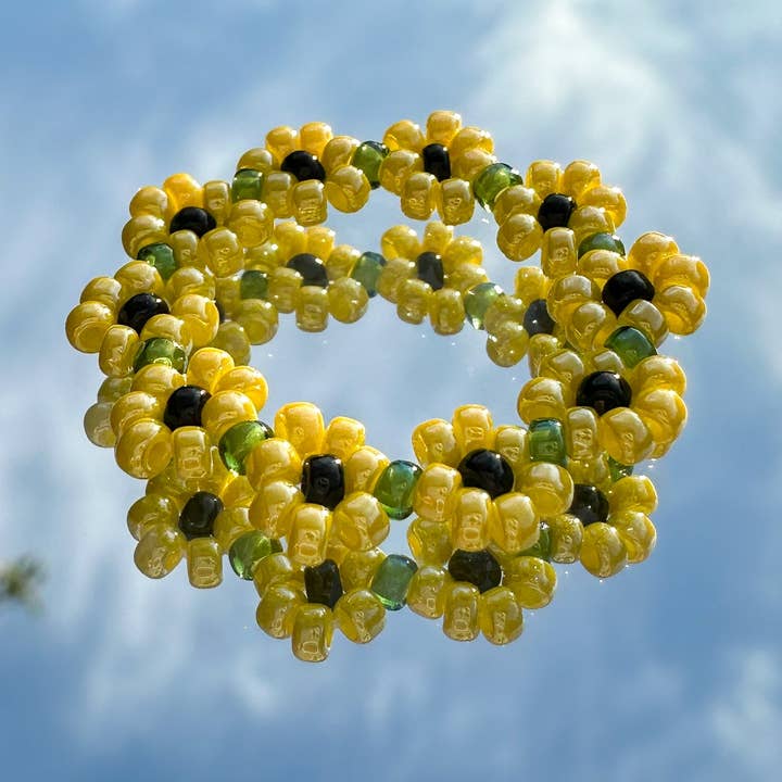 Flower ring made of glass beads "Sunny Meadow" with sunflowers for wholesale by cool people club