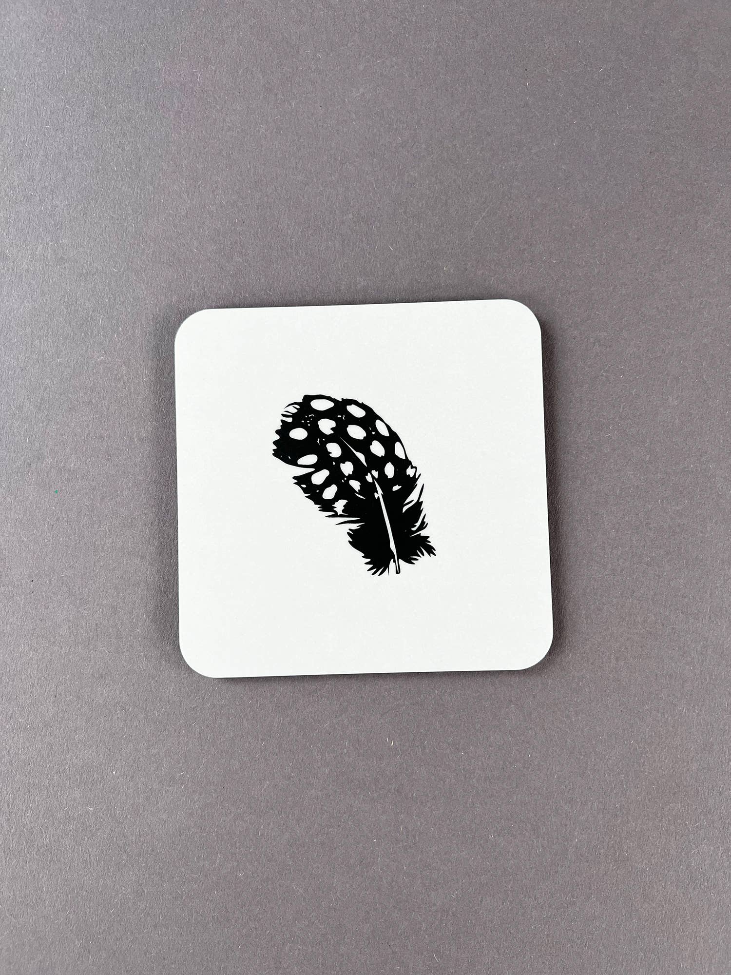 Penguin Ink – wholesale Coasters – Guinea Fowl Feather Coaster