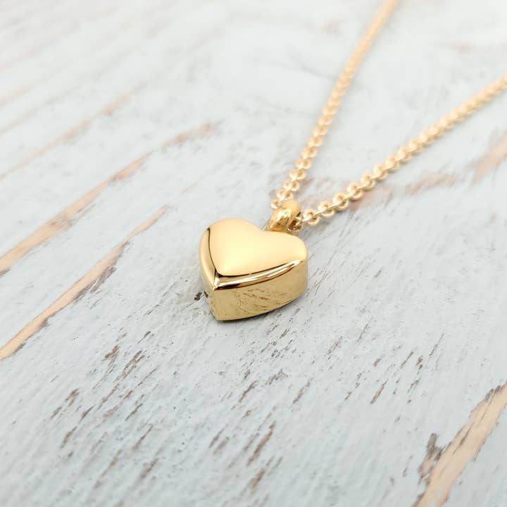 Tiny Gold Heart Urn Pendant - Gold Stainless Steel for wholesale by Just Vial