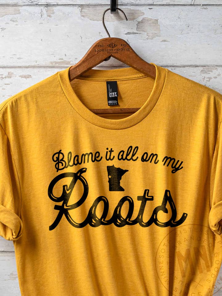 Blame It All On My Roots Country Music Graphic T-Shirt for wholesale by Minnesota Sisters