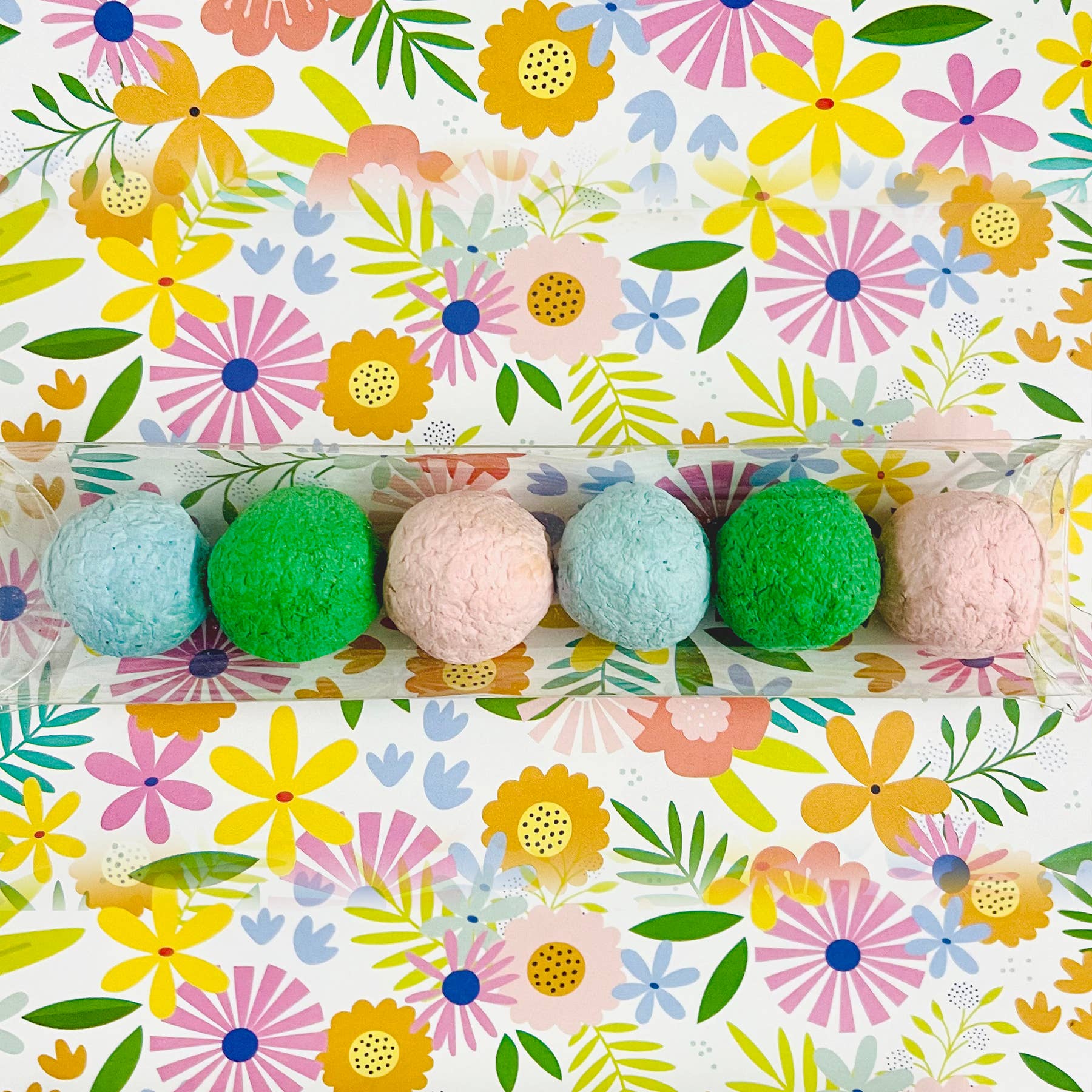 Gifts That Bloom - Wholesale Plant Seeds - Wildflower Seed Bombs with Flower Background1