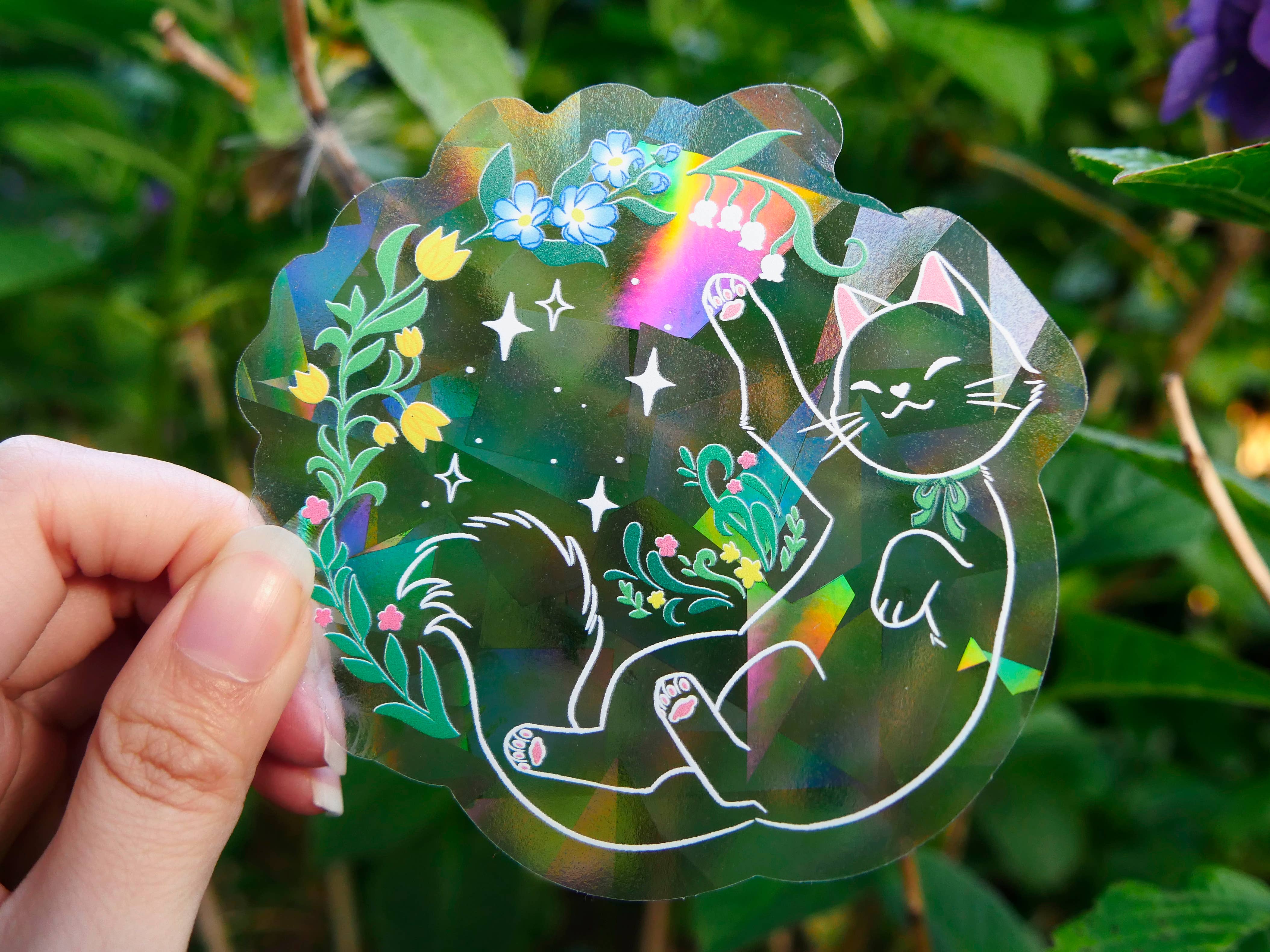 Meg-chan Doodles – wholesale Suncatcher – Rainbow Suncatcher | Blooming Kitten | Holographic Sticker1