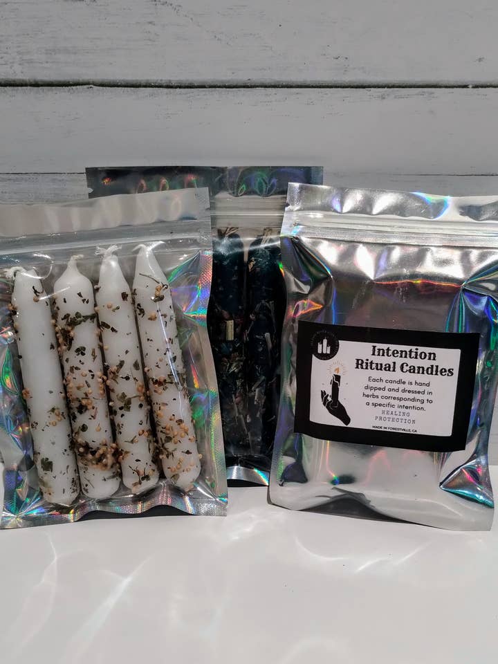Hand Dipped Intention Candles for wholesale by Muddy River Conjure