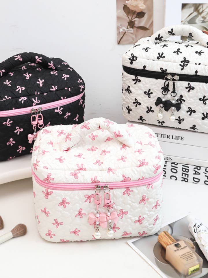 Quilted Bow Print Zip Top Makeup Bag for wholesale by Juniper Tide