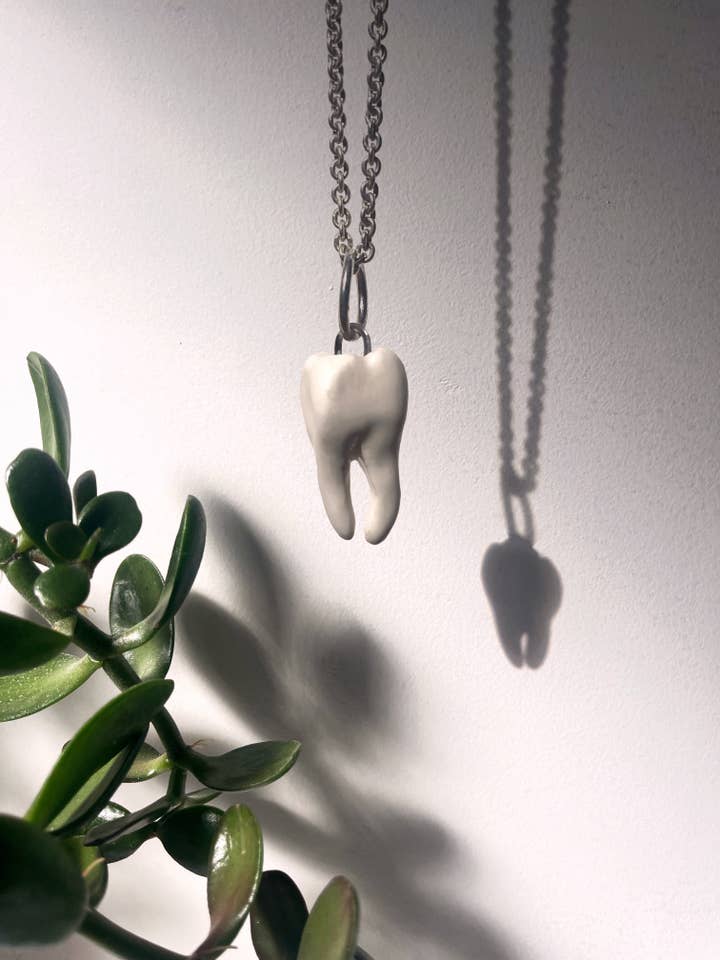 Handmade Ceramic Tooth Charm for wholesale by bystphie