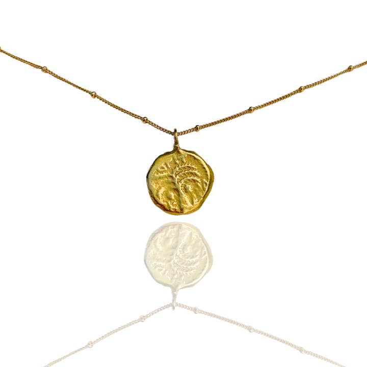 ANCIENNE PIÈCE EN FORME DE PALMIER pour la vente par LOVE CORRIN