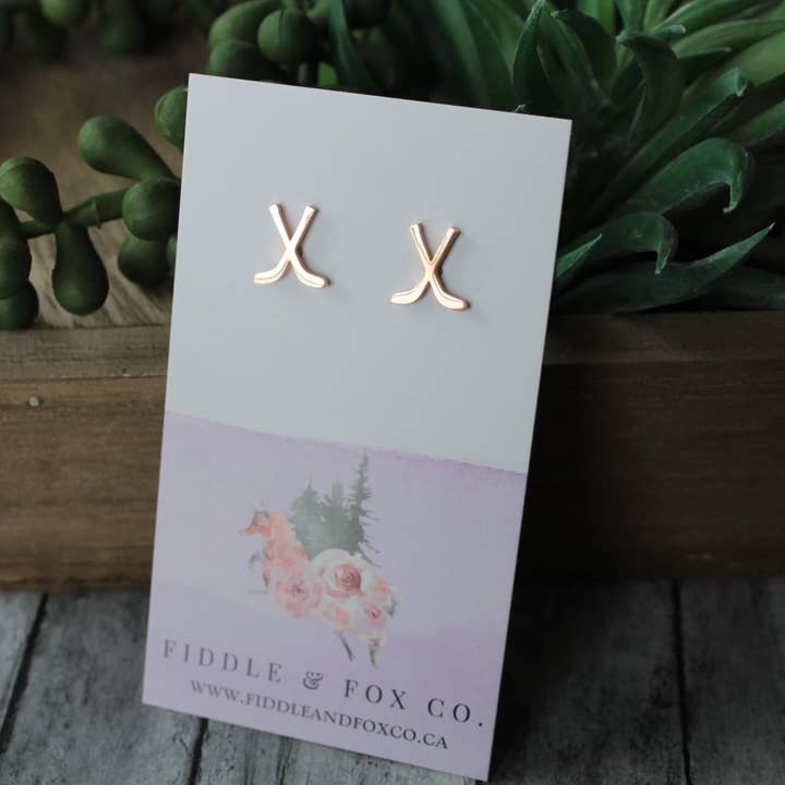 Rose Gold Hockey Stick Earrings for wholesale by Fiddle & Fox