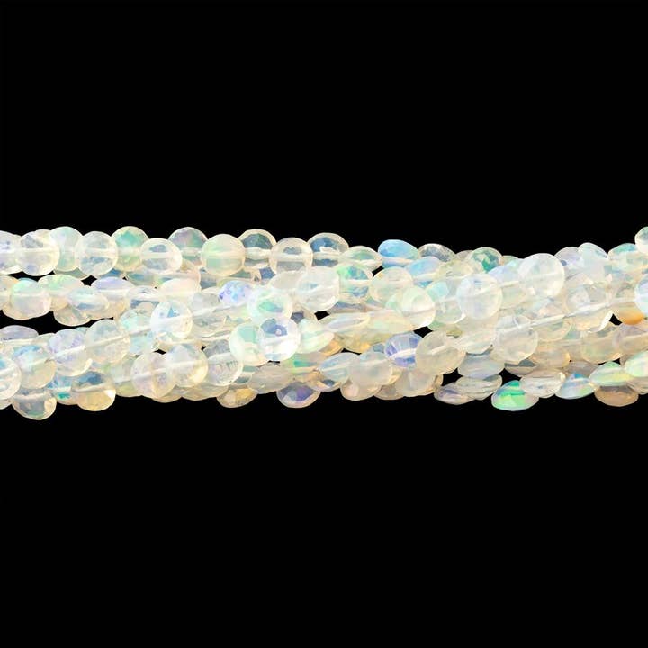 3.5-4mm Ethiopian Opal Pavilion Faceted Coin 16 inch 126 Beads AA for wholesale by Beads of Cambay