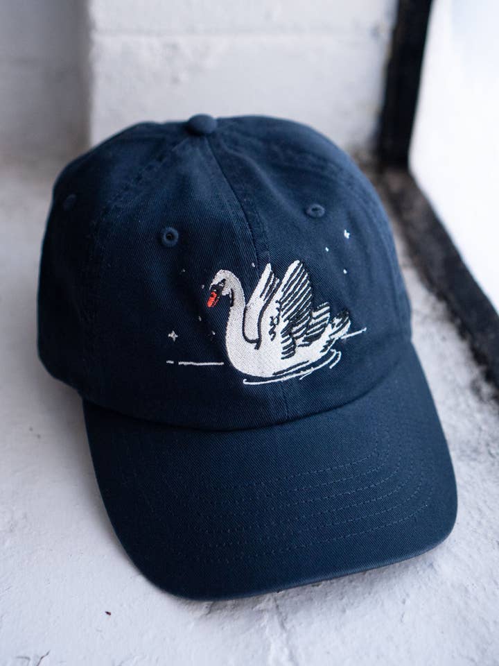 Night Swans Hat | Embroidered Swan Dad Hat for wholesale by Stay Home Club