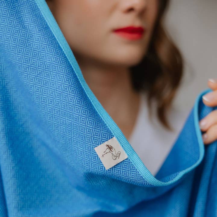 Fascia portabebè Leo Turchese per la vendita all'ingrosso da parte di Storchenwiege GmbH & Co. KG