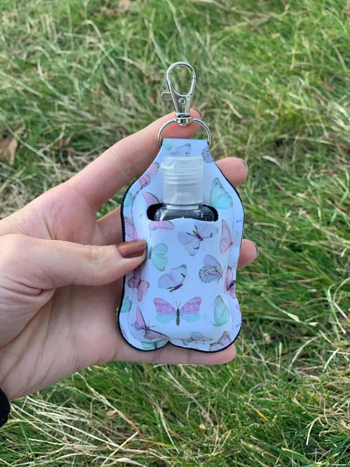 Colorful Butterfly Hand Sanitizer Holder Keychain for wholesale by The E Tribe Co.