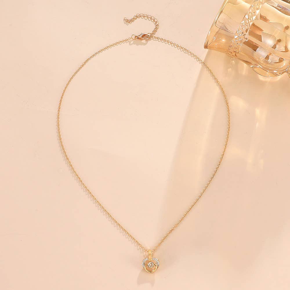 Gemscape UK - Vente Colliers à pendentif - Collier en forme de cœur en or et argent : des bijoux pour tous10