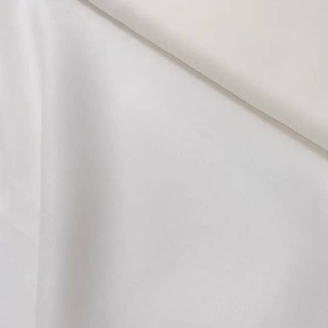 Premium lightweight pure linen solid white $32/yd for wholesale by Exquisite Fabrics