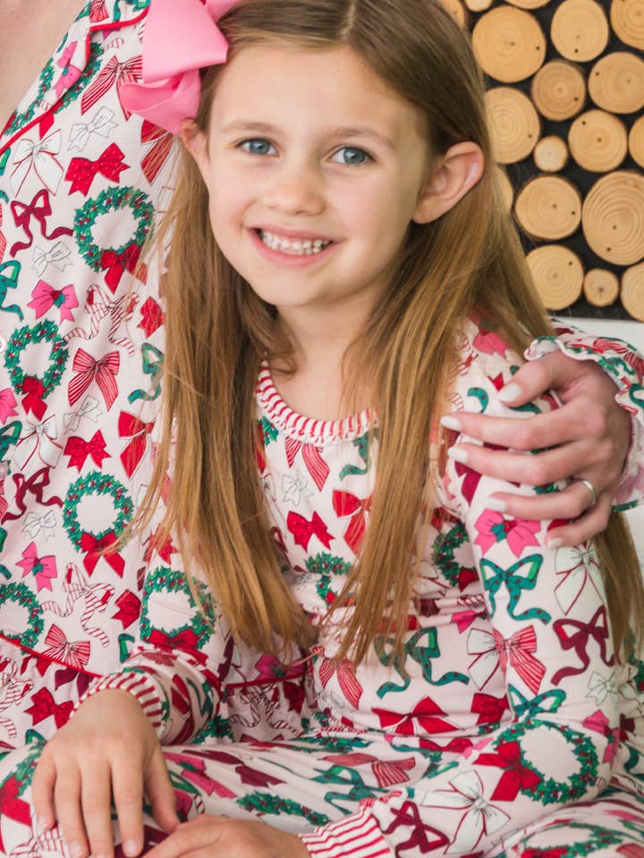 Pink SoftSnooze™ Girls Bamboo Viscose Holly Bows Ruffle Long Sleeve Pajama Set
for wholesale on Faire4