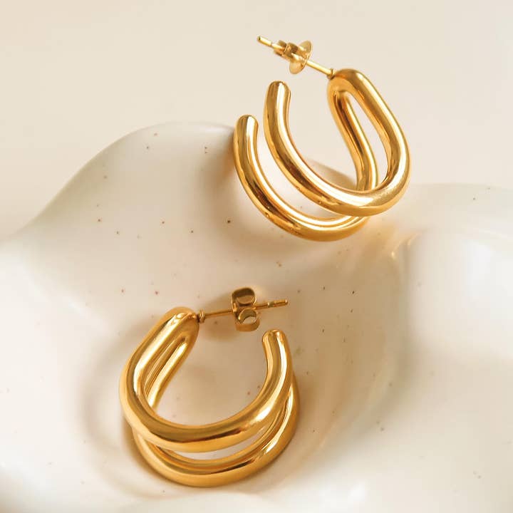 Lucille 18K Gold Non-Tarnish Double C Hoop Earring and other Purchase Wholesale saraswati. Free Returns & Net 60 Terms on Faire trending on Faire.