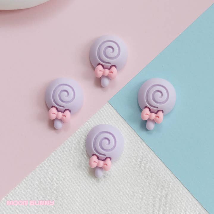 Random pcs Macaron Lollipops for wholesale on Faire1