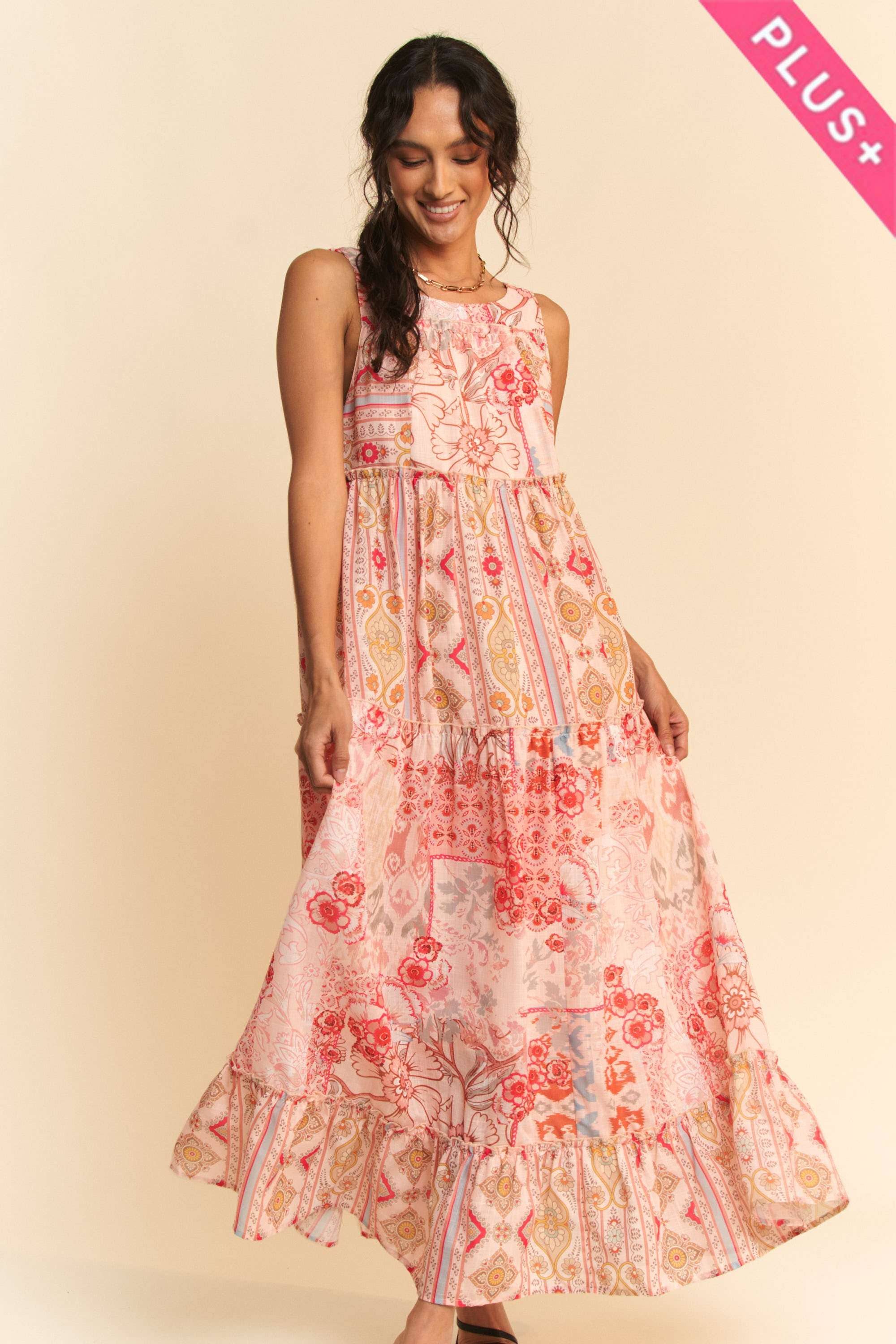 Coral Multi PLUS GEO FLORAL MIX SLEEVELESS TIRERED MAXI DRESS for wholesale on Faire9