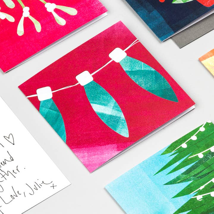 Turquoise Lights Christmas Card for wholesale by Fiona Clabon Illustration