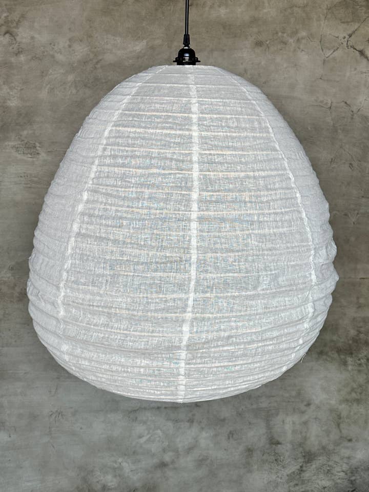 Very large Japanese-style pendant light in rattan and natural linen, drop-shaped H65 D70 for wholesale by Office Objets