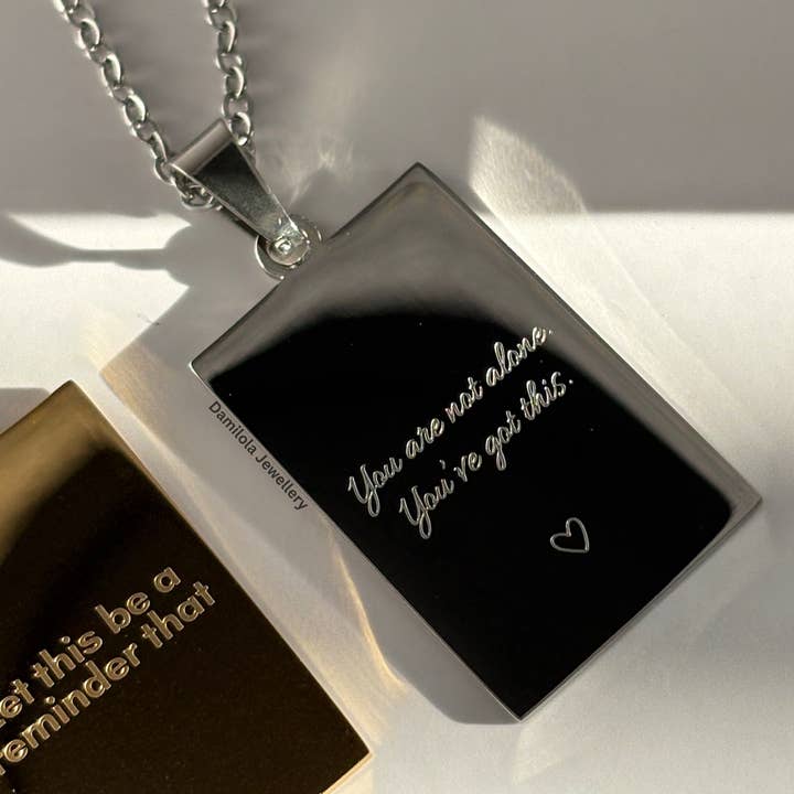 Damilola Jewellery – wholesale Pendant/charm necklace – ‘You are not alone’ Necklace - Gold/Silver - Double Sided2