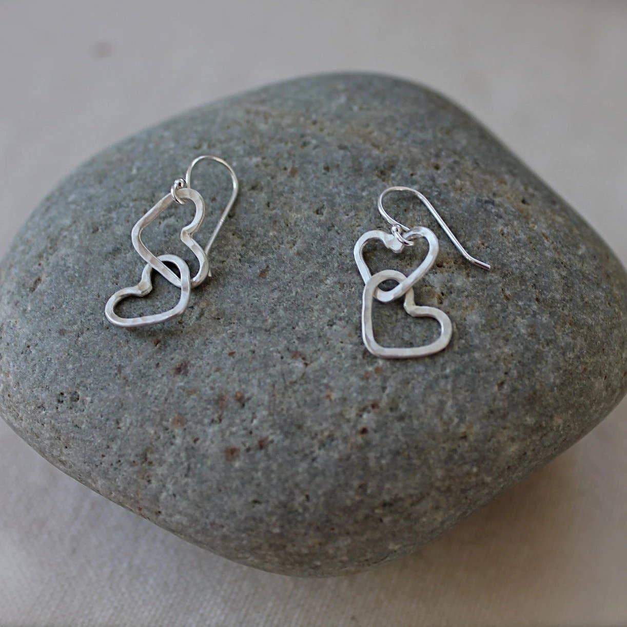 Kitty Stoykovich Designs - Wholesale Dangle Earrings - Hearts Linked Together Earrings In Silver